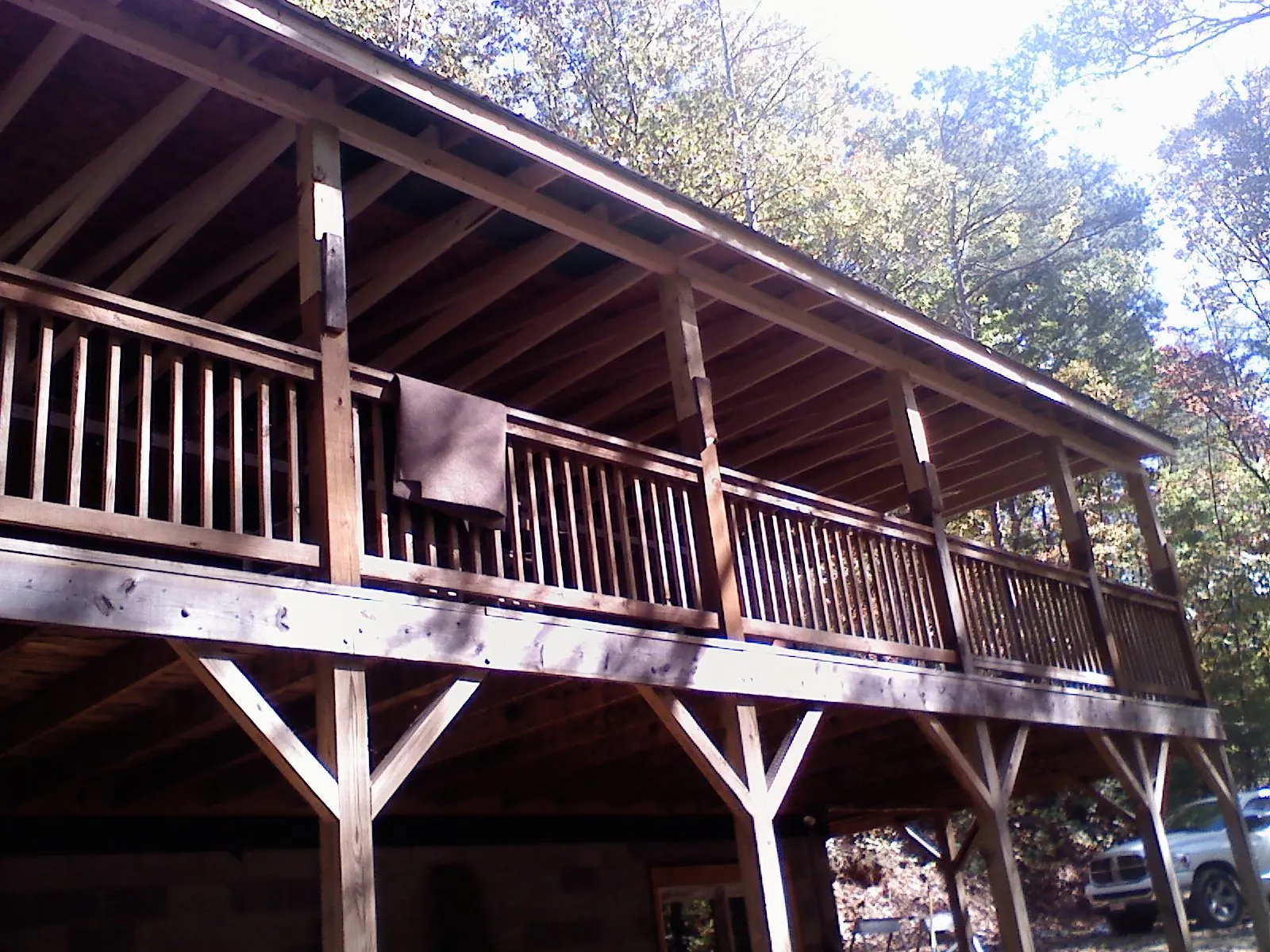 Timber framing under a new elevated porch and deck — Roof Leak Repair in Ocheyedan by Roofing Brothers